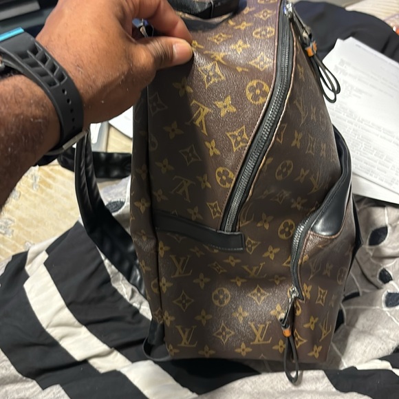 Louis Vuitton Monogram Discovery Backpack - Picture 15 of 17